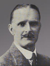Poträttbild av Herbert Adams